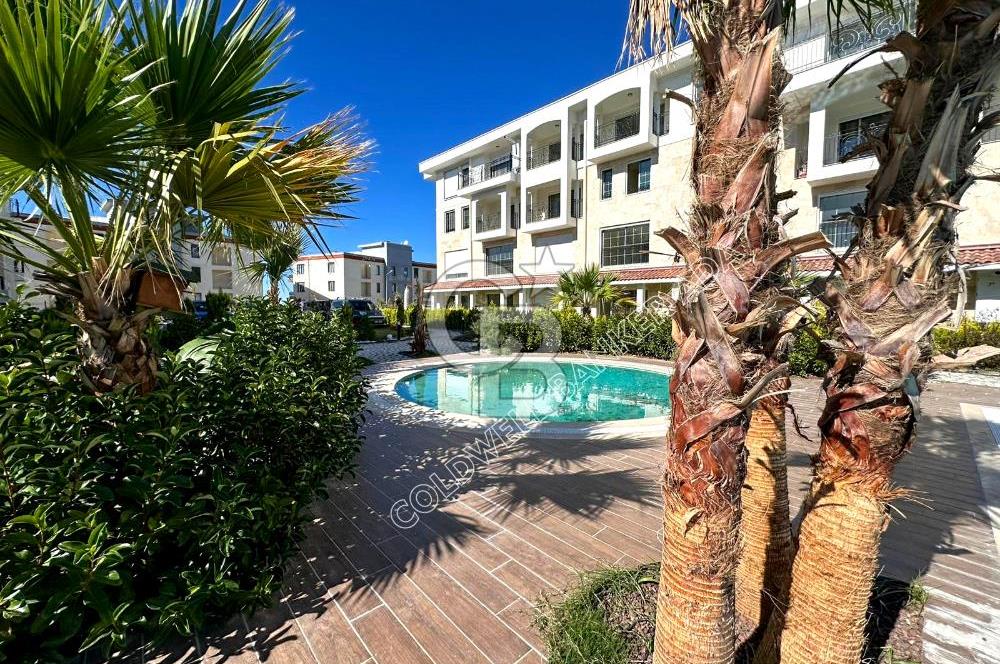 Kuşadası Değirmendere’de Bahçeli, Havuzlu Sitede Kiralık Daire