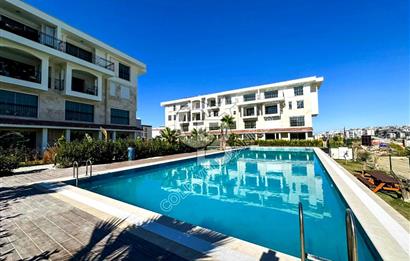 Kuşadası Değirmendere’de Bahçeli, Havuzlu Sitede Kiralık Daire