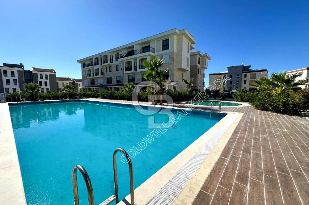 Kuşadası Değirmendere’de Bahçeli, Havuzlu Sitede Kiralık Daire