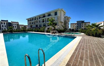 Kuşadası Değirmendere’de Bahçeli, Havuzlu Sitede Kiralık Daire