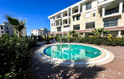 Kuşadası Değirmendere’de Bahçeli, Havuzlu Sitede Kiralık Daire