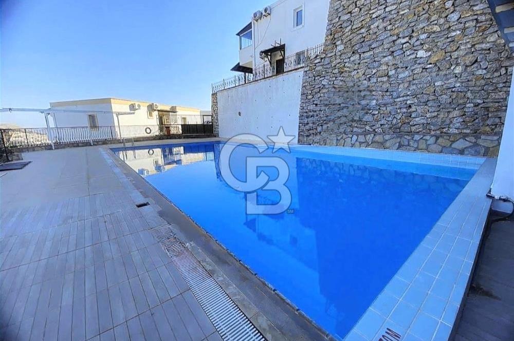 BODRUM YENİKÖY HAVUZLU SİTEDE DENİZ MANZARALI SATILIK 3+1