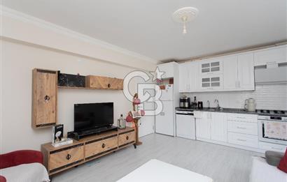 Foça Yenibağarası Mah. Satılık 2+1 Bahçe Katı Daire