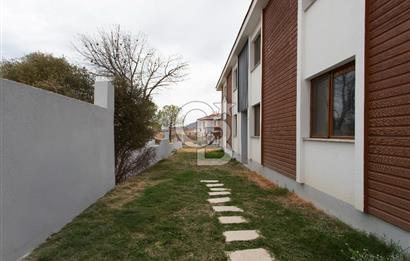 Foça Yenibağarası Mah. Satılık 2+1 Bahçe Katı Daire