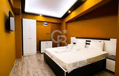 KUŞADASI KADINLAR DENİZİN'DE DENİZE 70 MT MESAFEDE SATILIK OTEL