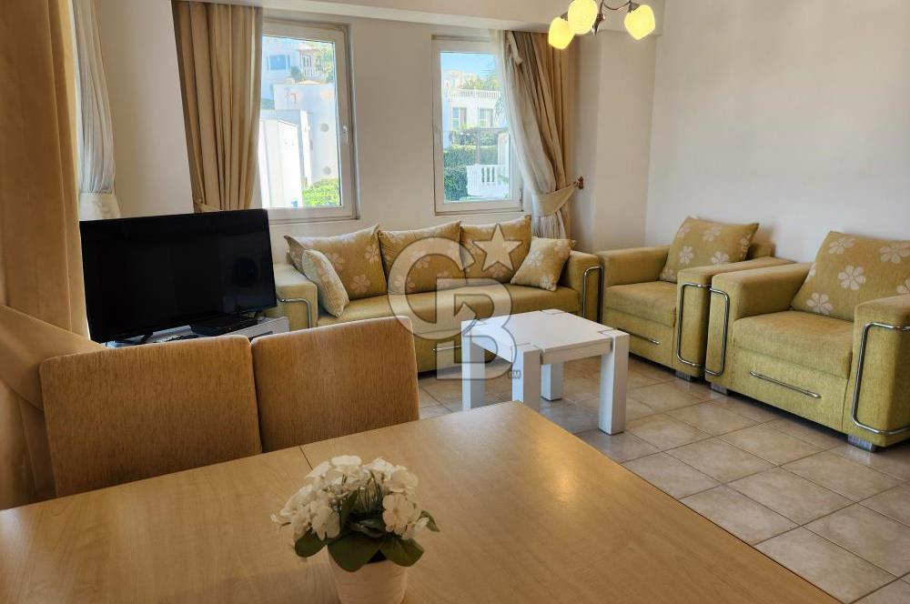 YALIKAVAK GERİŞ SOSYAL TESİSLİ SİTEDE DENİZ MANZARALI DAİRE