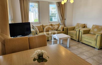 YALIKAVAK GERİŞ SOSYAL TESİSLİ SİTEDE DENİZ MANZARALI DAİRE