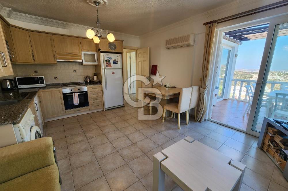 YALIKAVAK GERİŞ SOSYAL TESİSLİ SİTEDE DENİZ MANZARALI DAİRE