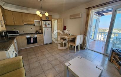 YALIKAVAK GERİŞ SOSYAL TESİSLİ SİTEDE DENİZ MANZARALI DAİRE