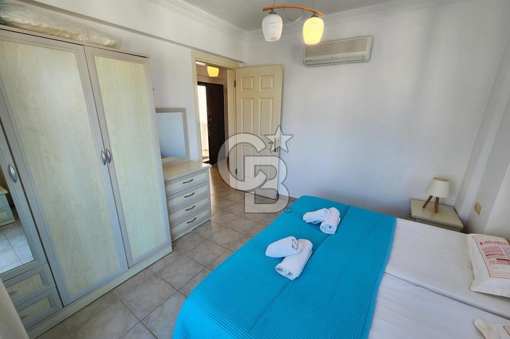 YALIKAVAK GERİŞ SOSYAL TESİSLİ SİTEDE DENİZ MANZARALI DAİRE