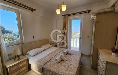 YALIKAVAK GERİŞ SOSYAL TESİSLİ SİTEDE DENİZ MANZARALI DAİRE