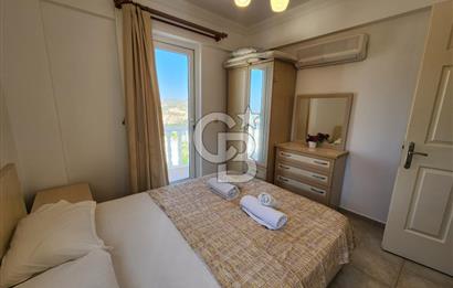 YALIKAVAK GERİŞ SOSYAL TESİSLİ SİTEDE DENİZ MANZARALI DAİRE