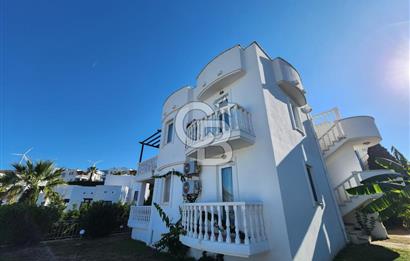 YALIKAVAK GERİŞ SOSYAL TESİSLİ SİTEDE DENİZ MANZARALI DAİRE