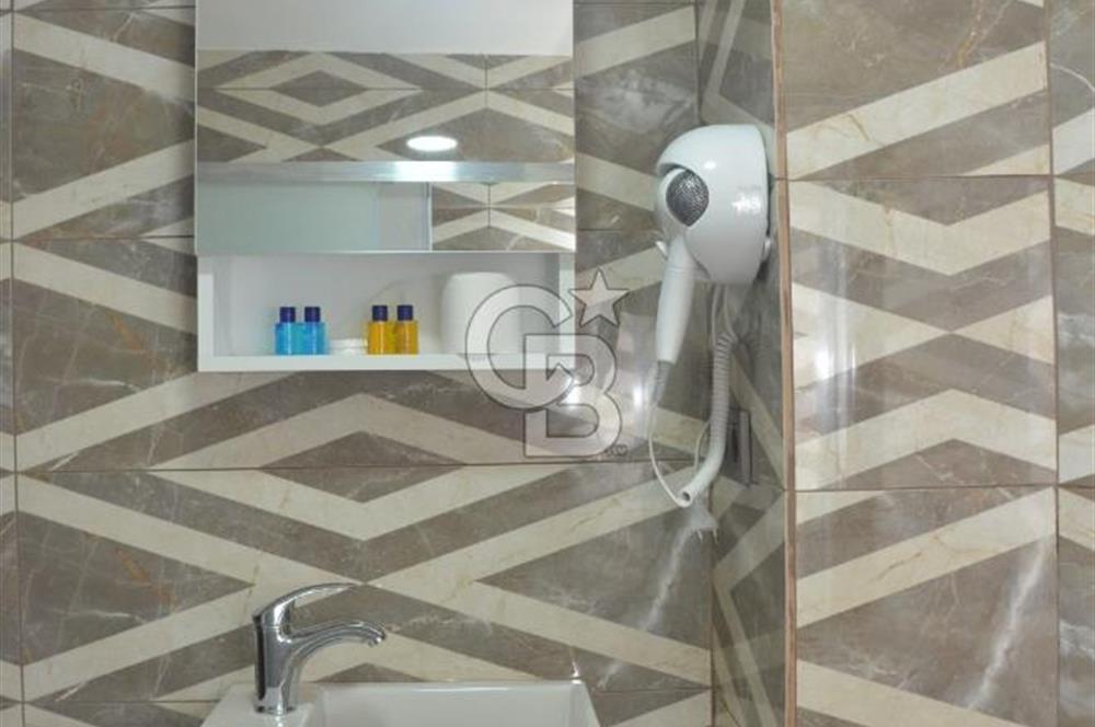 KUŞADASI KADINLAR DENİZİN'DE DENİZE 70 MT MESAFEDE SATILIK OTEL