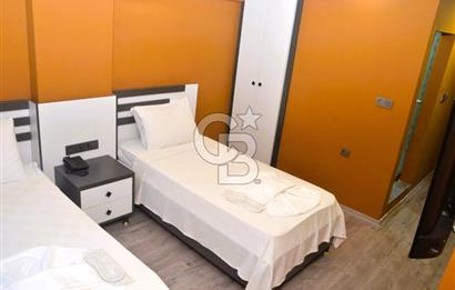 KUŞADASI KADINLAR DENİZİN'DE DENİZE 70 MT MESAFEDE SATILIK OTEL