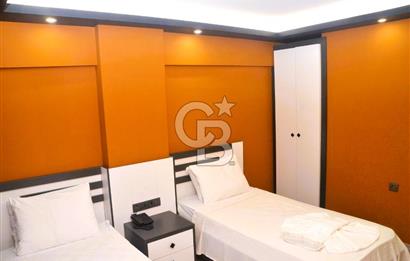 KUŞADASI KADINLAR DENİZİN'DE DENİZE 70 MT MESAFEDE SATILIK OTEL