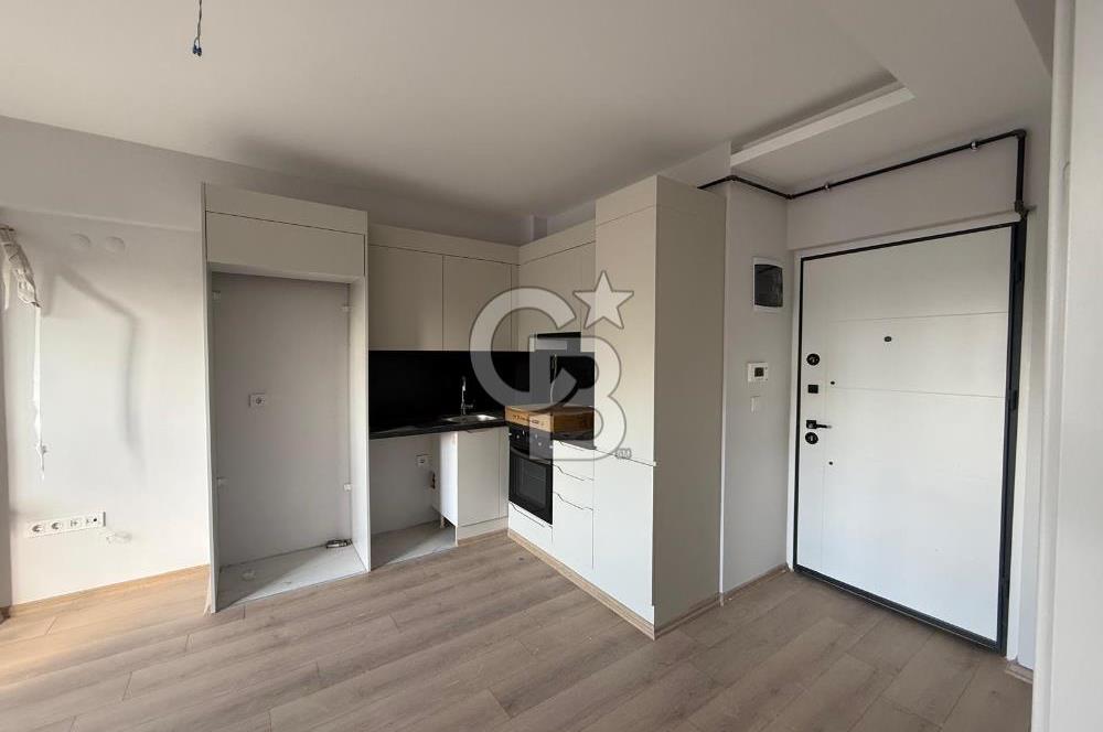 Bornova Çamdibi Tuval Yapıda Kiralık Arakat 1+1 Daire 