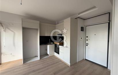 Bornova Çamdibi Tuval Yapıda Kiralık Arakat 1+1 Daire 