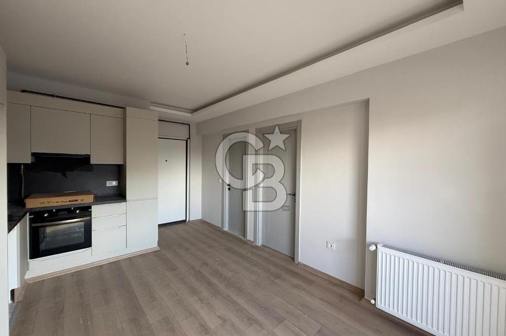 Bornova Çamdibi Tuval Yapıda Kiralık Arakat 1+1 Daire 