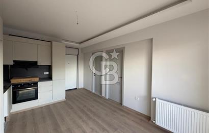 Bornova Çamdibi Tuval Yapıda Kiralık Arakat 1+1 Daire 