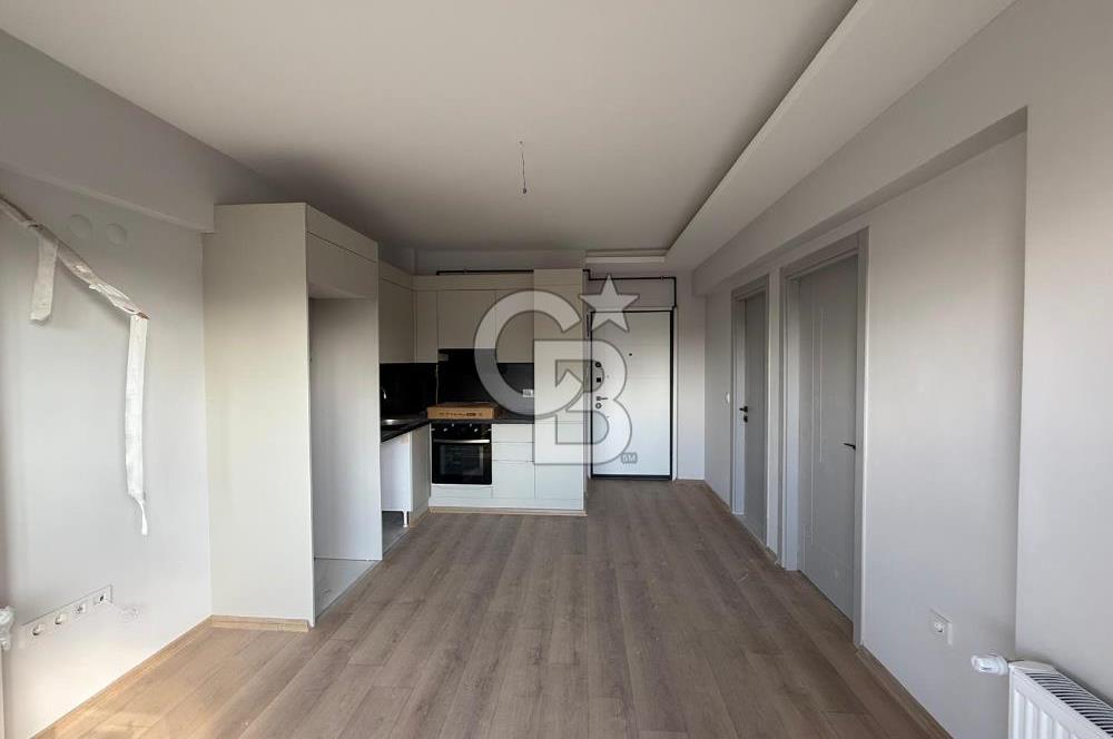 Bornova Çamdibi Tuval Yapıda Kiralık Arakat 1+1 Daire 