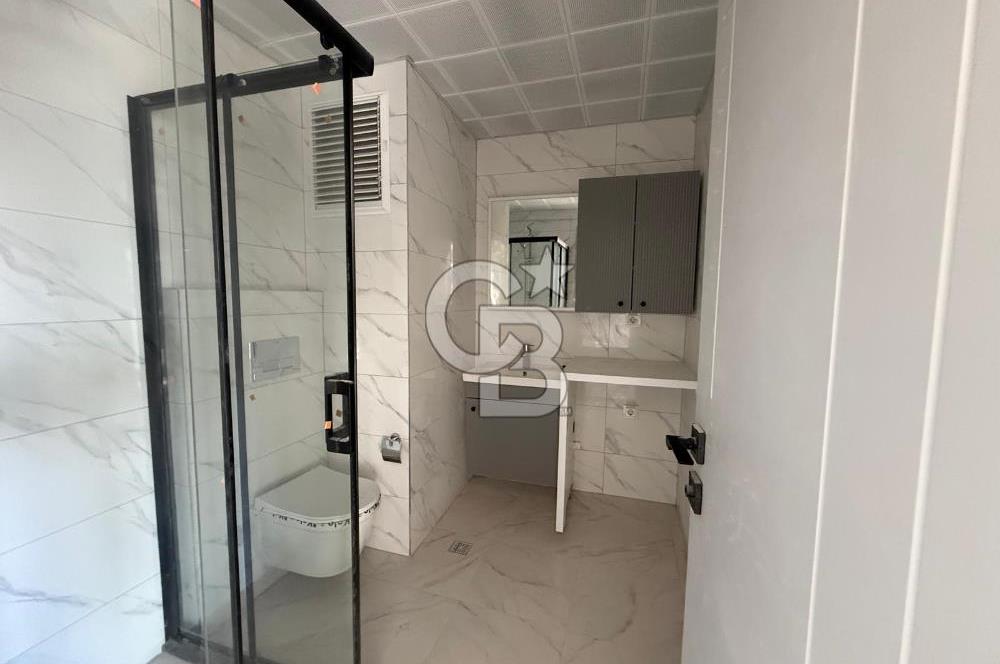 Bornova Çamdibi Tuval Yapıda Kiralık Arakat 1+1 Daire 