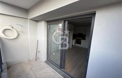 Bornova Çamdibi Tuval Yapıda Kiralık Arakat 1+1 Daire 