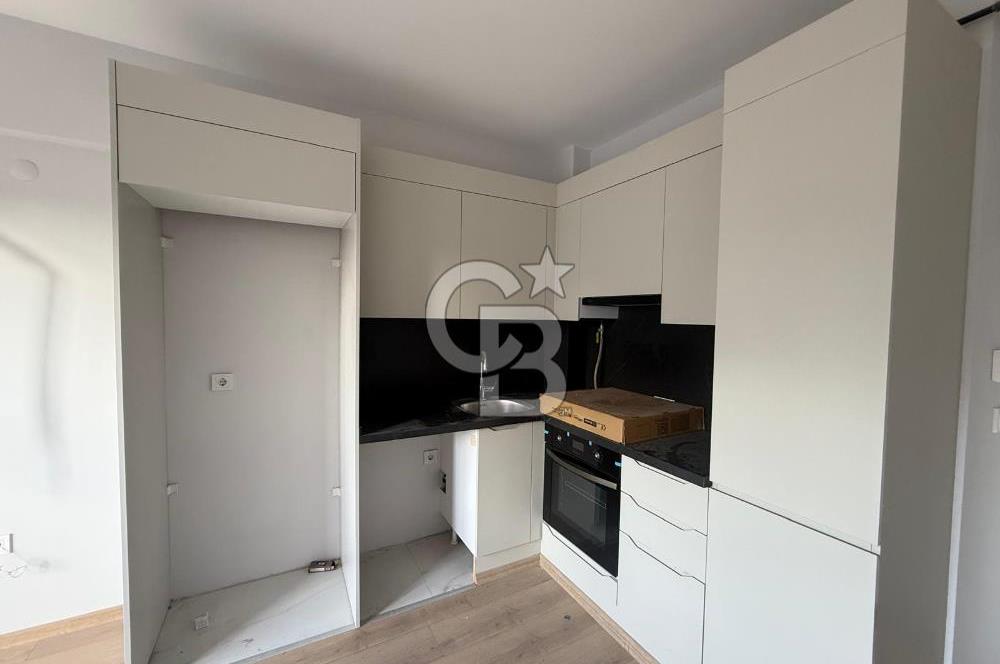 Bornova Çamdibi Tuval Yapıda Kiralık Arakat 1+1 Daire 