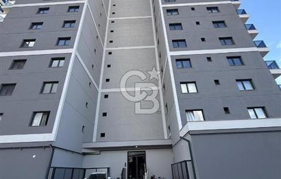 Bornova Çamdibi Tuval Yapıda Kiralık Arakat 1+1 Daire 