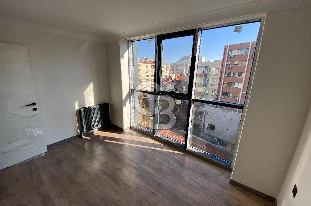 ATATÜRK CADDESİ KUĞULU PARK YANI KÖŞE SIFIR 1+1 DAİRE OTOPARKLI