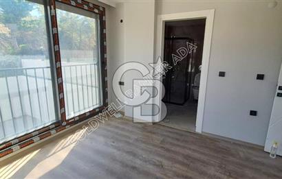 KUŞADASI SOĞUCAK TA SATILIK SIFIR 4+1 ÖZEL HAVUZLU TRİPLEX VİLLA