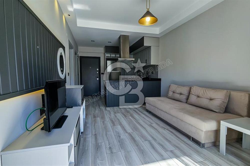 KUŞADASI KUŞTUR MAHALLESİNDE DENİZE YÜRÜME MESAFESİNDE 1+1 RESİDENCE 