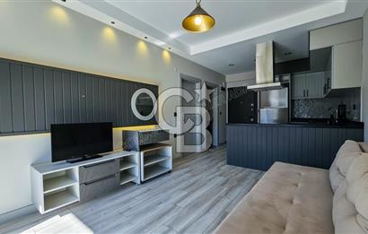 KUŞADASI KUŞTUR MAHALLESİNDE DENİZE YÜRÜME MESAFESİNDE 1+1 RESİDENCE 