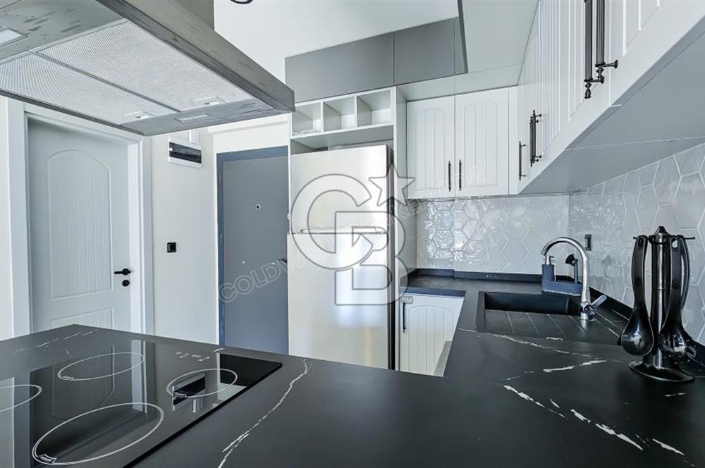 KUŞADASI KUŞTUR MAHALLESİNDE DENİZE YÜRÜME MESAFESİNDE 1+1 RESİDENCE 