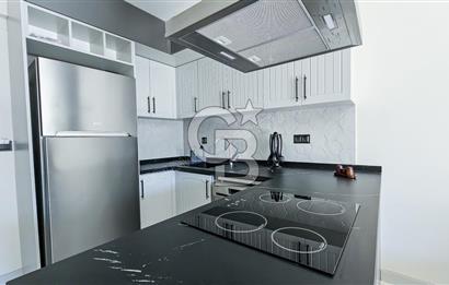 KUŞADASI KUŞTUR MAHALLESİNDE DENİZE YÜRÜME MESAFESİNDE 1+1 RESİDENCE 