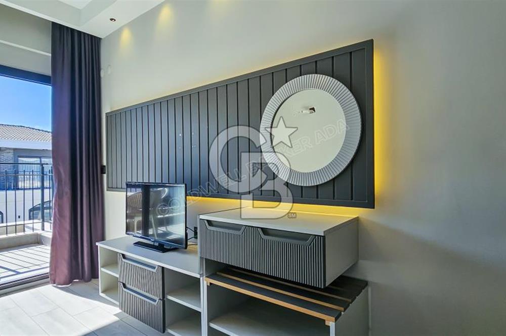 KUŞADASI KUŞTUR MAHALLESİNDE DENİZE YÜRÜME MESAFESİNDE 1+1 RESİDENCE 