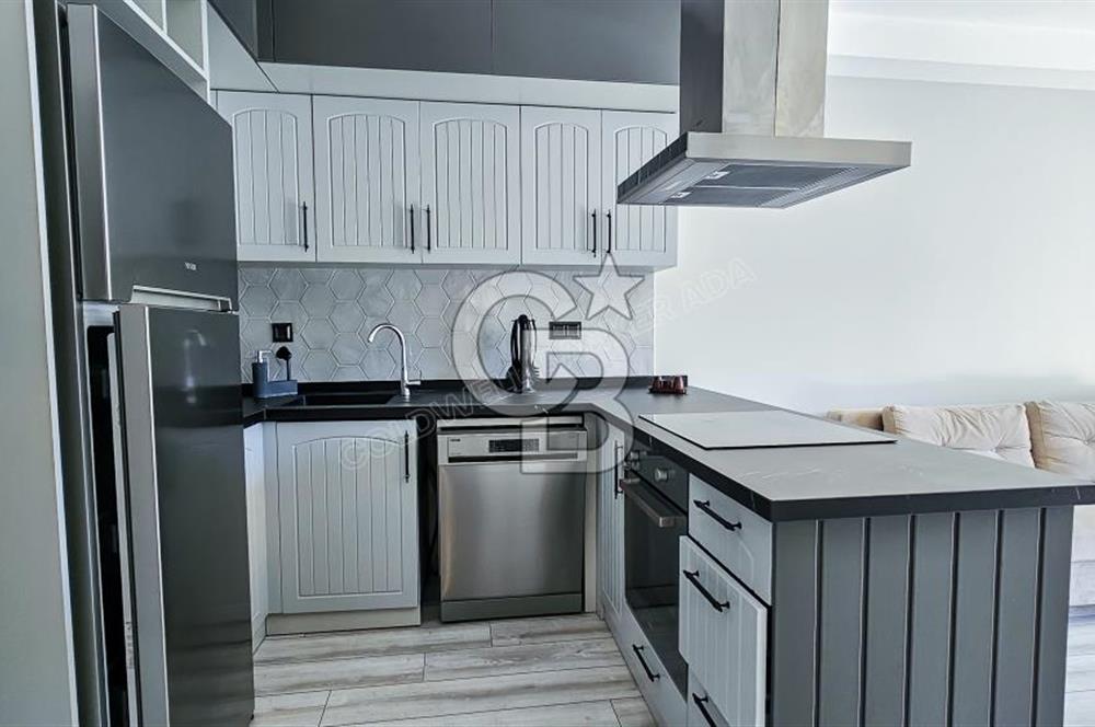 KUŞADASI KUŞTUR MAHALLESİNDE DENİZE YÜRÜME MESAFESİNDE 1+1 RESİDENCE 