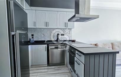 KUŞADASI KUŞTUR MAHALLESİNDE DENİZE YÜRÜME MESAFESİNDE 1+1 RESİDENCE 