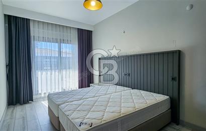 KUŞADASI KUŞTUR MAHALLESİNDE DENİZE YÜRÜME MESAFESİNDE 1+1 RESİDENCE 