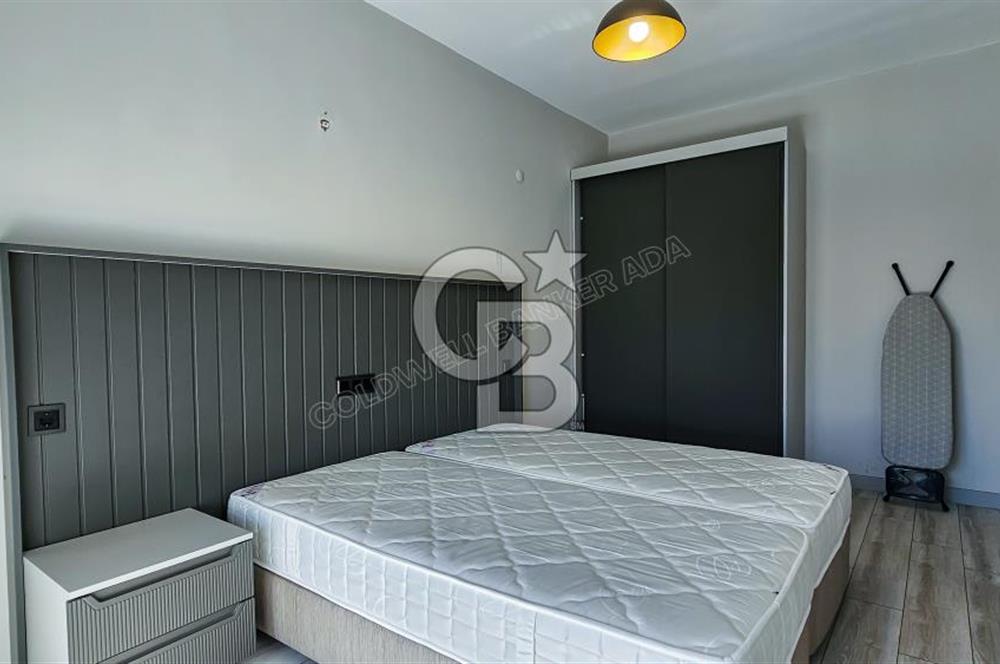 KUŞADASI KUŞTUR MAHALLESİNDE DENİZE YÜRÜME MESAFESİNDE 1+1 RESİDENCE 