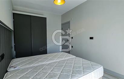 KUŞADASI KUŞTUR MAHALLESİNDE DENİZE YÜRÜME MESAFESİNDE 1+1 RESİDENCE 