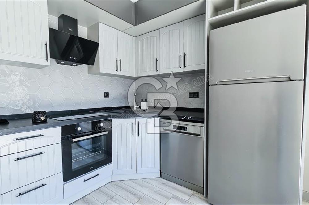 KUŞADASI KUŞTUR MAHALLESİNDE DENİZE YÜRÜME MESAFESİNDE 1+1 RESİDENCE 