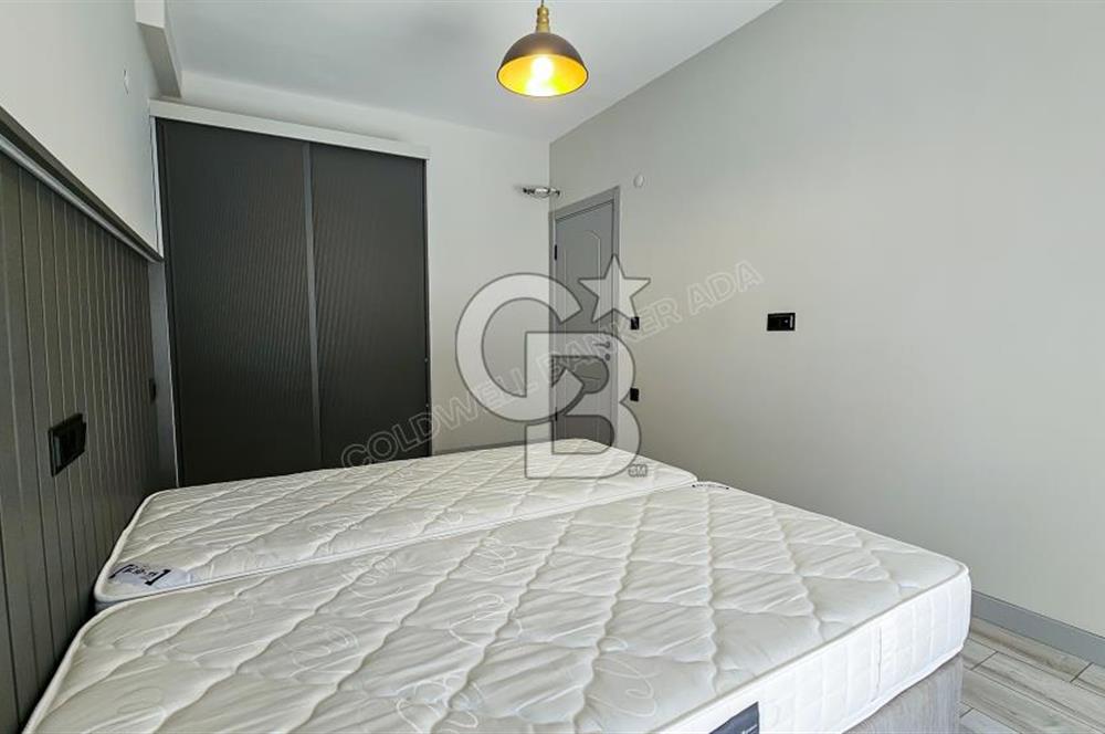 KUŞADASI KUŞTUR MAH. GENİŞ BAHÇE PAYI OLAN EŞYALI 1+1 RESİDENCE 