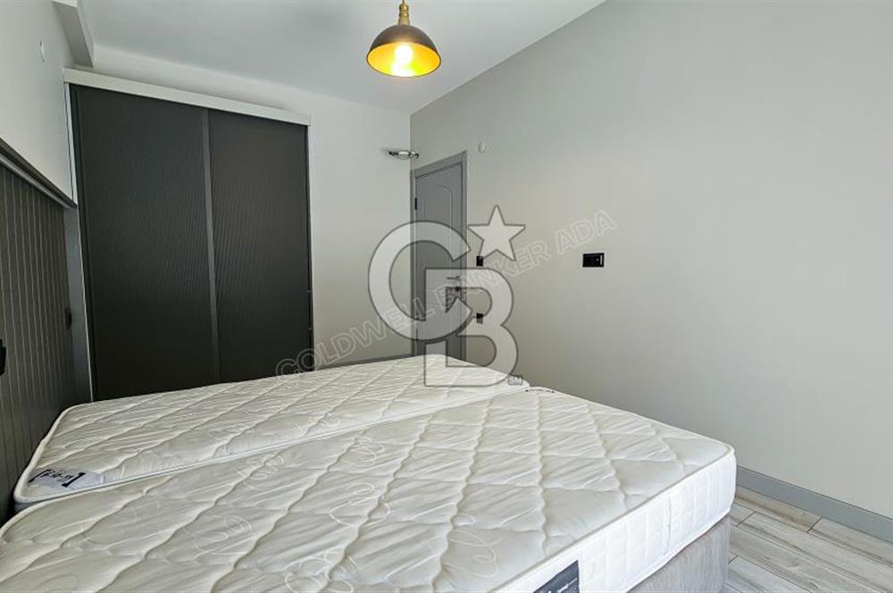 KUŞADASI KUŞTUR MAH. GENİŞ BAHÇE PAYI OLAN EŞYALI 1+1 RESİDENCE 