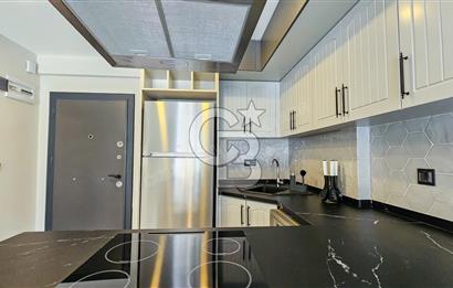 KUŞADASI KUŞTUR MAH. GENİŞ BAHÇE PAYI OLAN EŞYALI 1+1 RESİDENCE 