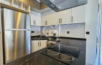 KUŞADASI KUŞTUR MAH. GENİŞ BAHÇE PAYI OLAN EŞYALI 1+1 RESİDENCE 