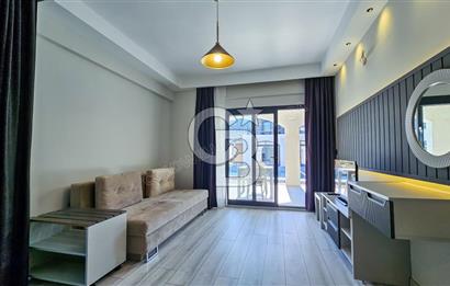 KUŞADASI KUŞTUR MAH. GENİŞ BAHÇE PAYI OLAN EŞYALI 1+1 RESİDENCE 