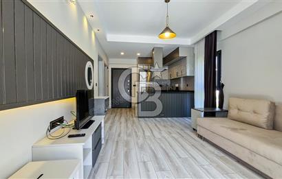 KUŞADASI KUŞTUR MAH. GENİŞ BAHÇE PAYI OLAN EŞYALI 1+1 RESİDENCE 