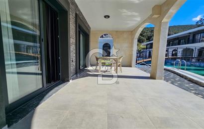 KUŞADASI KUŞTUR MAH. GENİŞ BAHÇE PAYI OLAN EŞYALI 1+1 RESİDENCE 