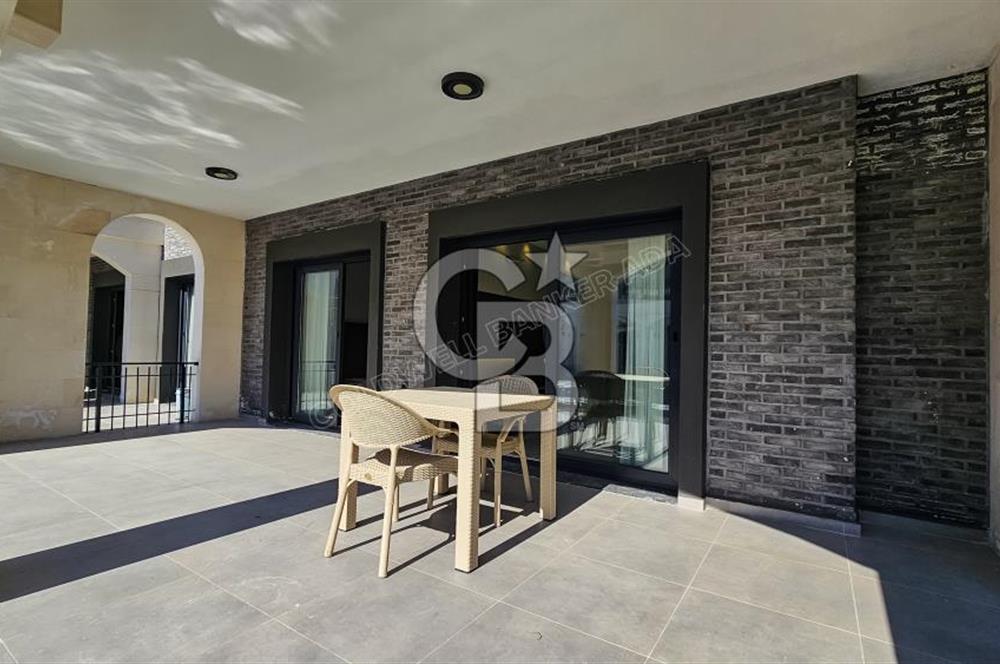 KUŞADASI KUŞTUR MAH. GENİŞ BAHÇE PAYI OLAN EŞYALI 1+1 RESİDENCE 